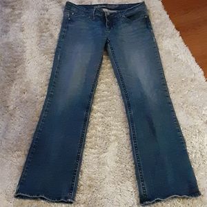 Refuge stretch barely bootcut denim blue jeans factory distressed size 9…EUC